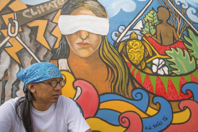 Fresque murale pour la justice climatique sur les îles Tuvalu, menacées par la montée des eaux © Steven Lyon / Greenpeace