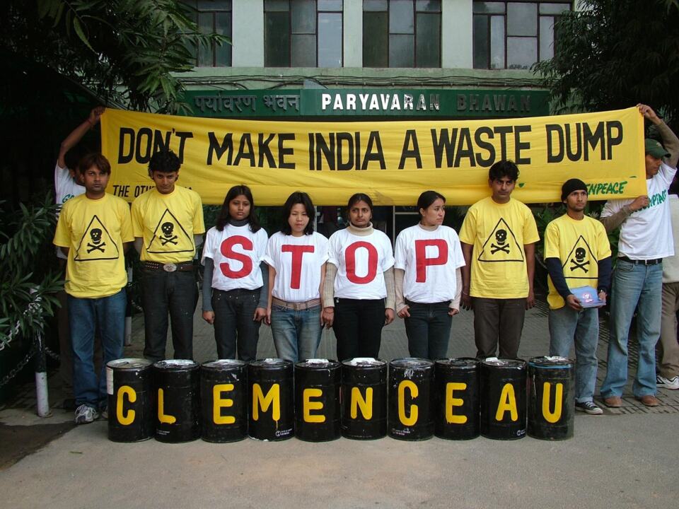  - Greenpeace activists took the campaign against the illegal import of the Clemenceau to the doorstep of the Ministry of Environment and Forests (MoEF), holding up a banner stating 'Don't make India a waste dump' and lining up barrels painted with the letters C L E M E N C E A U. Greenpeace also delivered hundreds of petition postcards signed by Indian citizens in eight cities, with the clear demand that Minister A. Raja do the right thing, and ask France to take back the toxic decommissioned aircraft carrier.