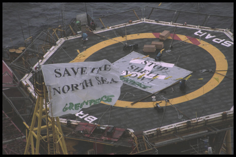  - Aerials of Brent Spar, banner on heli pad, Greenpeace activists scaled and took up residence on the Brent Spar, a disused oil platform to stop its owner, Shell, from dumping the rusting hulk and its highly toxic contents to the sea bed. Shell's planned dump comes just one month before North Sea environment ministers meet in Denmark in June. Greenpeace remained on the Brent Spar for 27 days. North Sea