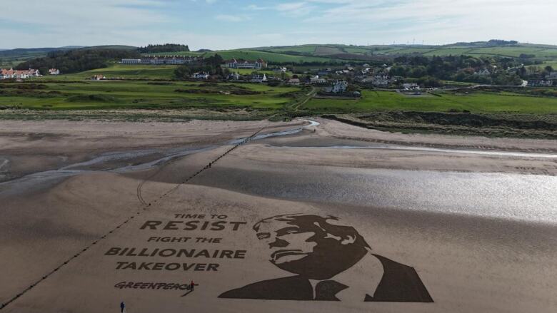 Huge Protest Artwork Appears by Trump’s Golf Course in Scotland.