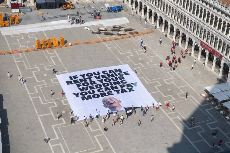 Jeff Bezos’ Wedding Banner Action in Venice.