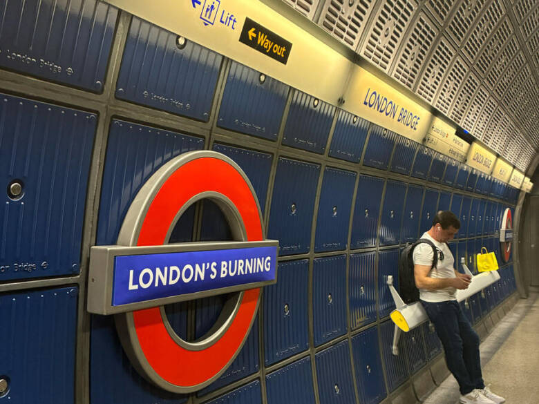 London's Burning Tube Sign in London Underground.