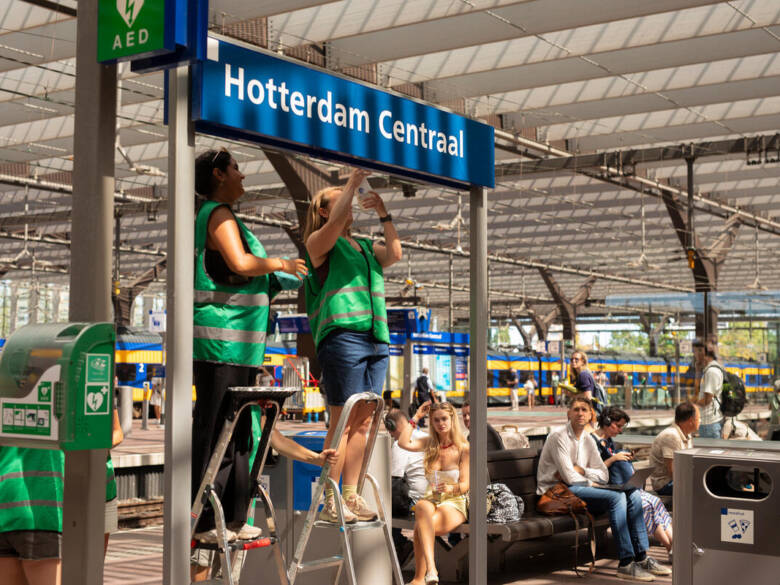 Activists Rename Train Stations during Extreme Summer Heatwave in the Netherlands.